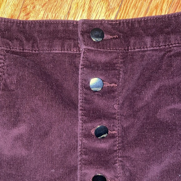 Express corduroy mini skirt. Burgundy. Fun metal grey buttons. Has pockets! - Picture 2 of 4